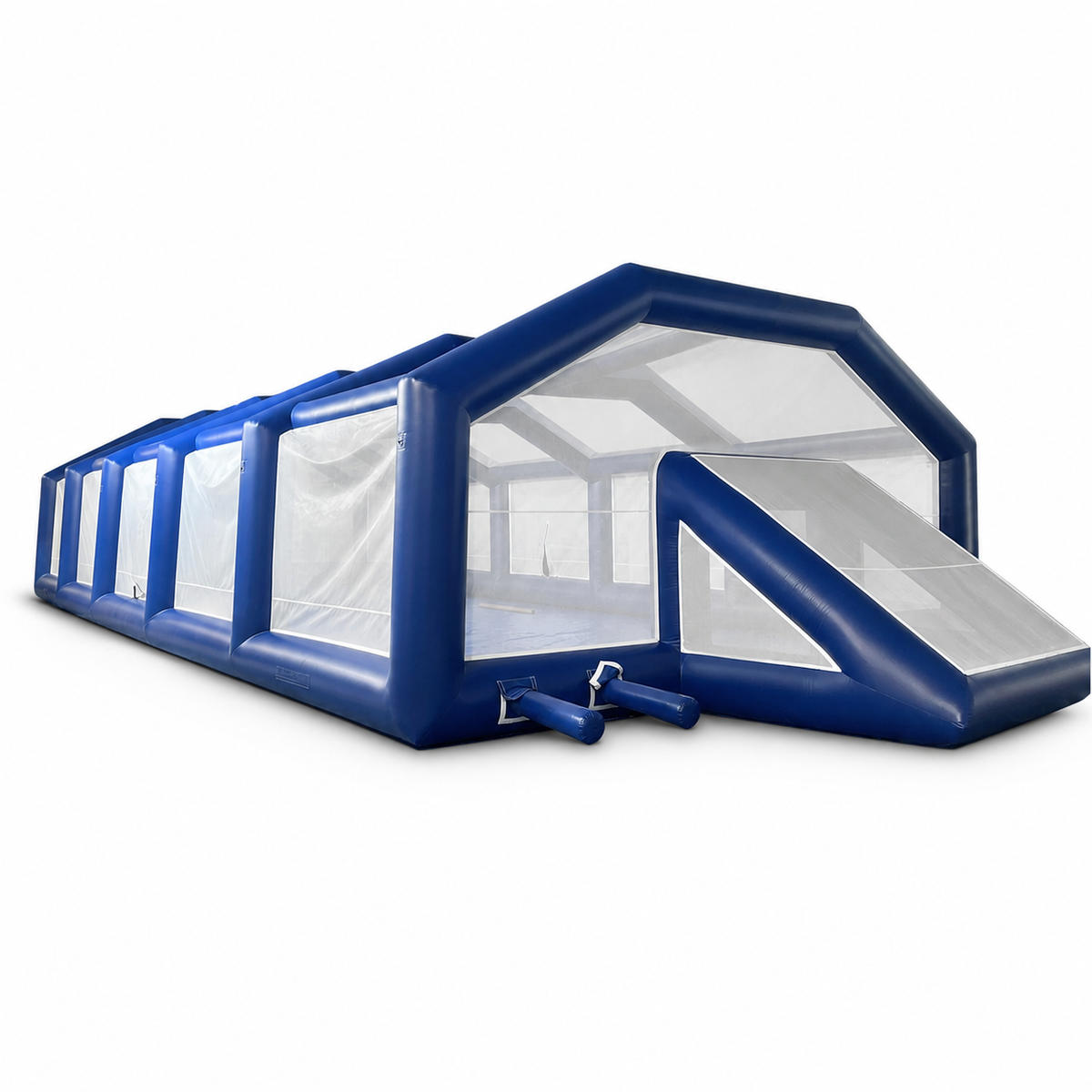 Covered commercial inflatable soccer field with perimeter walls and netting on white background